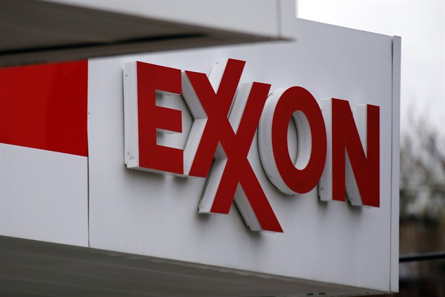 FILE PHOTO: This April 29, 2014 photo shows an Exxon sign at a Exxon gas station in Carnegie, Pa. 
