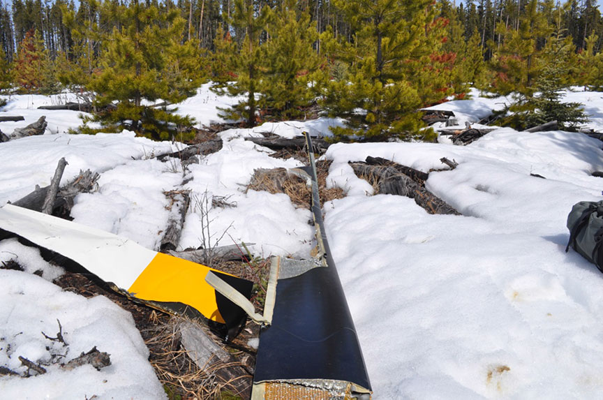 Photo showing the detached rotor blade. An investigation has determined that the helicopter broke up in flight over Fox Creek, Alberta on 27 January 2013 due to "inappropriate control inputs that caused the main rotor blade to make contact with the fuselage.".