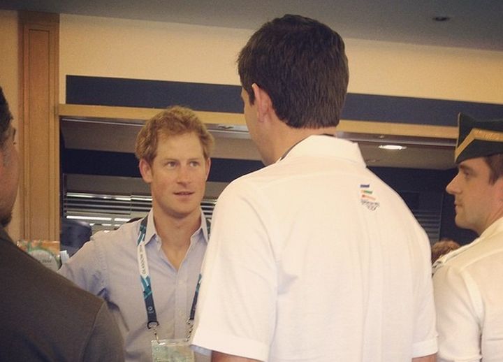 Edmonton Mayor Don Iveson speaks with Prince Harry at the Commonwealth Games in Glasgow, Scotland Tuesday, July 29, 2014.