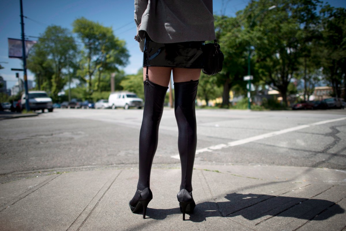 A sex trade worker is pictured in downtown Vancouver, B.C., Wednesday, June, 3, 2014. THE CANADIAN PRESS/Jonathan Hayward.