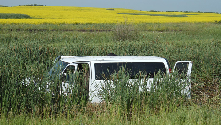 Man taken to Saskatoon hospital after eight passenger van goes into slough near Young, Sask.
