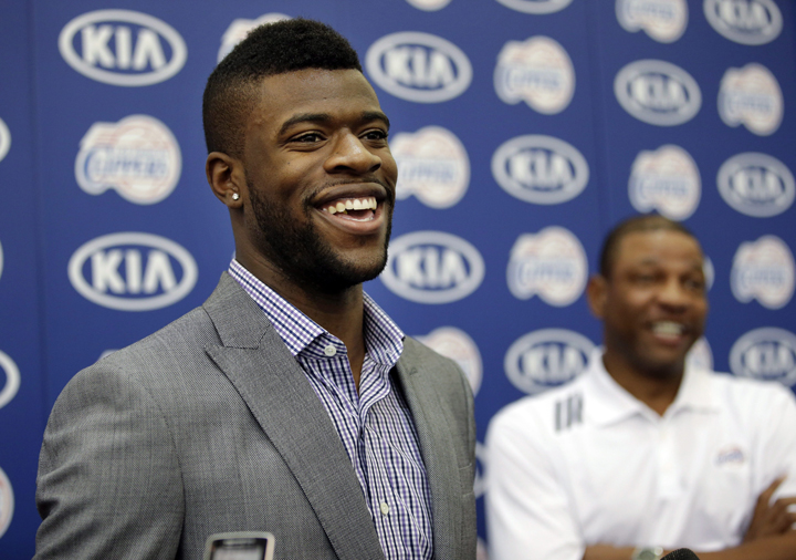 Reggie Bullock, the Los Angeles Clippers' first-round choice in the 2013 National Basketball Association draft, talks to reporters during a news conference in Los Angeles, Monday, July 8, 2013.