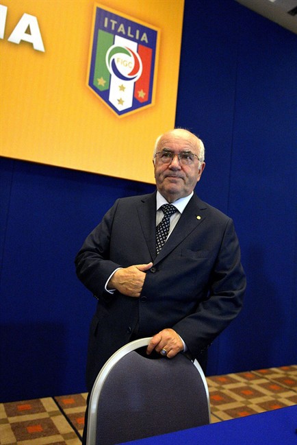 In this picture taken Friday, July 25, 2014, Carlo Tavecchio attends a National Amateur League meeting in Rome. FIFA has asked the Italian football federation to open an investigation into alleged racist comments made by FIGC presidential candidate Carlo Tavecchio. 