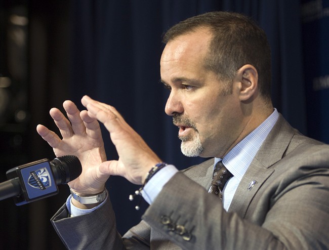 Montreal Impact President Joey Saputo announces that sporting director Nick de Santis has been relieved of his duties at a press conference, Wednesday, July 30, 2014 in Montreal.