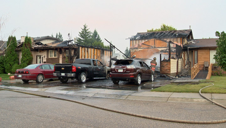 A fire early Thursday morning in Saskatoon has heavily damaged two homes.