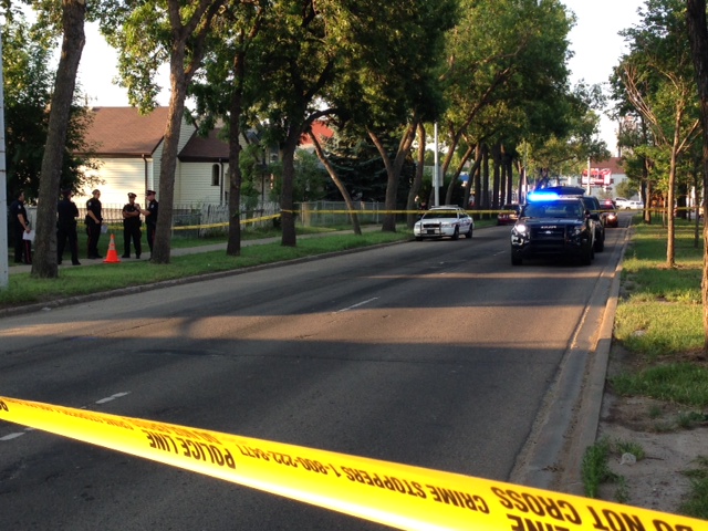 Edmonton Police investigating a shooting on 97 St., near 111 Ave. Thursday, July 31, 2014.