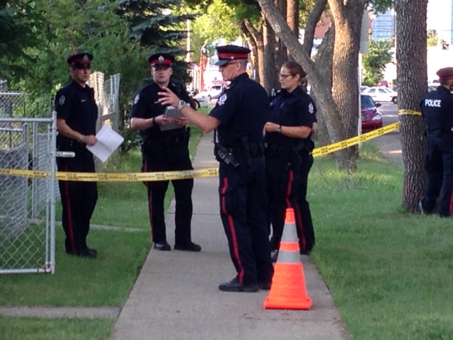 Edmonton Police investigating a shooting on 97 St., near 111 Ave. Thursday, July 31, 2014.