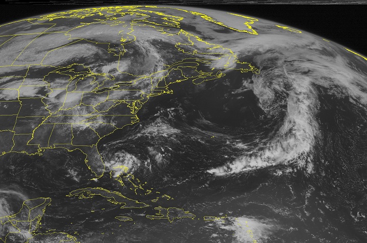 This NOAA satellite image shows a swirl of clouds trying to organize around a centre of low pressure off the eastern Florida Coast.