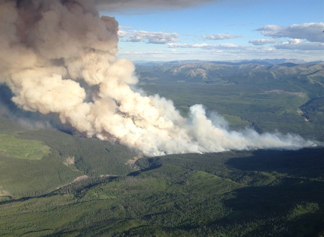An aerial view of the Red Deer Creek wildfire near the B.C./Alberta boundary is shown in a government of British Columbia handout photo. A raging wildfire has now burned through twenty-square kilometres of northeastern B.C. brush as the Red Deer Creek blaze is fanned by strong winds. THE CANADIAN PRESS/HO.