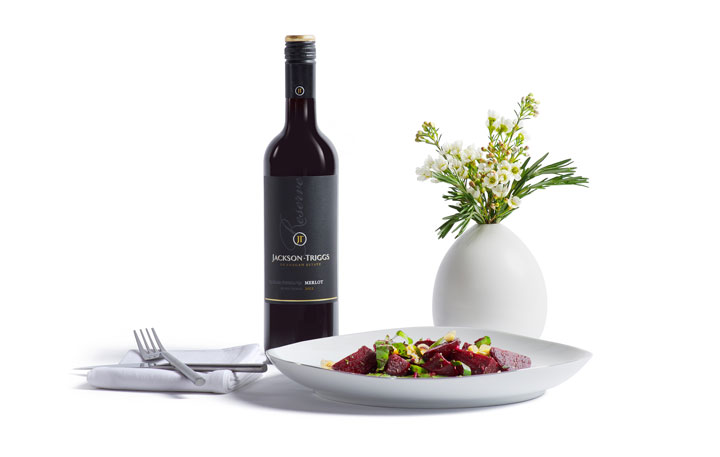 This photo shows Chef Tim Mackiddie's warm beet salad with mushroom vinegar, paired with Jackson-Triggs.