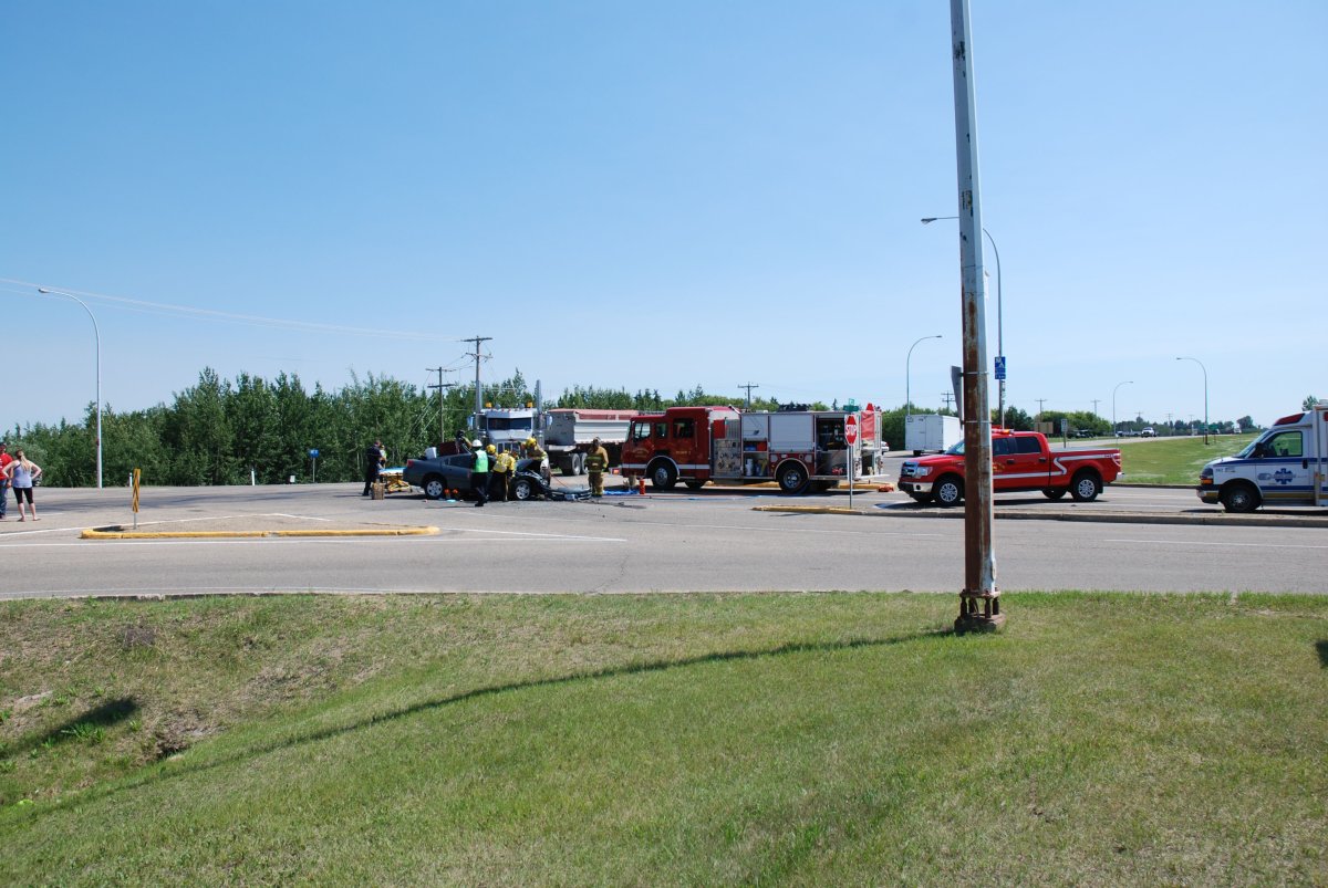 Two people were killed in after the car they were in collided with a gravel truck, Tuesday, July 8, 2014. 