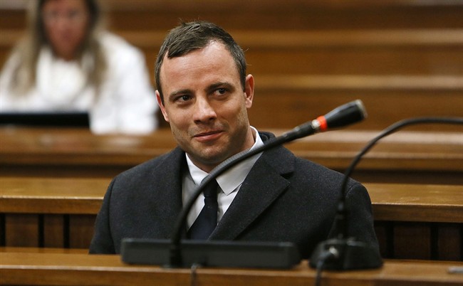 FILE - In this Tuesday, July 8, 2014 file photo Oscar Pistorius sits in the dock in Pretoria, South Africa, at his murder trial for the shooting death of his girlfriend Reeva Steenkamp on St. Valentine's Day, 2013.