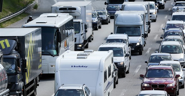 FILE - In this June 6, 2014 file picture cars queue up on higway 7 near Hamburg, Germany. Germany's transport minister plans to introduce a car toll that seeks to make money off foreign drivers. Germany has a truck toll but, unlike many European countries, no car toll.