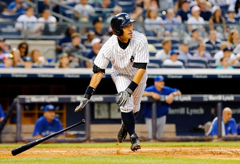 Ichiro Suzuki #31 of the New York Yankees follows through on a third inning three run home run against the Toronto Blue Jays at Yankee Stadium on July 25, 2014 in the Bronx borough of New York City. (Photo by Jim McIsaac/Getty Images).