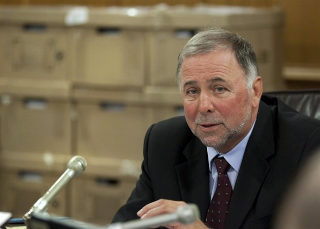 Pierre Paradis listens to testimonies Monday, September 12, 2011 at the legislature in Quebec City.