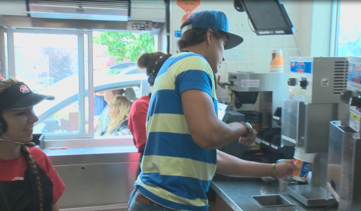 Edmonton Oiler Nail Yakupov serves up treats for Dairy Queen Miracle Treat Day, Aug. 14, 2014.