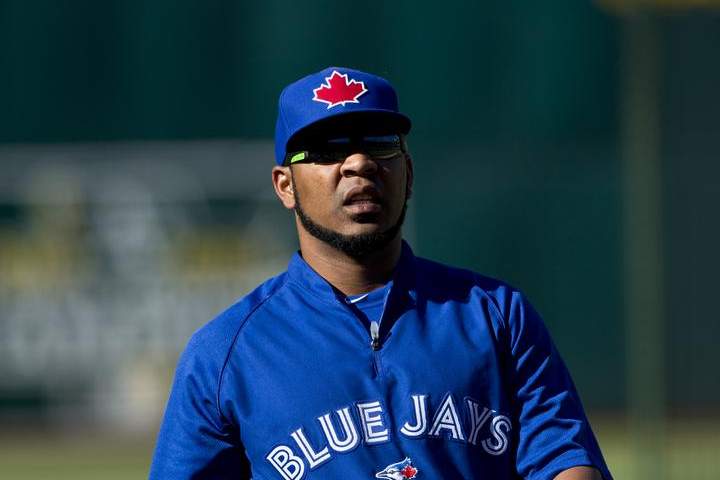 Edwin Encarnacion #10 of the Toronto Blue Jays walks across the field during batting practice before the game against the Oakland Athletics at O.co Coliseum on July 5, 2014