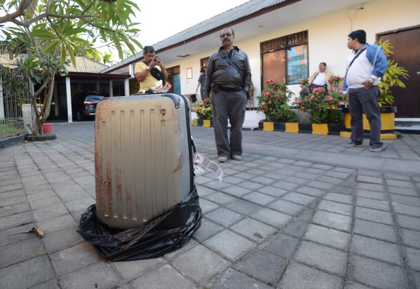 This photo taken on August 12, 2014 shows the suitcase where the body of a woman was found inside, displayed at a police station in Nusa Dua on the Indonesian resort island of Bali.  A US tourist's battered body has been found in a suitcase at the exclusive hotel on Indonesia's resort island of Bali and her daughter and daughter's boyfriend have been arrested over the killing, police said on August 13, 2014. The body of Sheila von Wiese Mack was found on August 12 stuffed into a suitcase in the boot of a taxi in front of the five-star St. Regis hotel. 