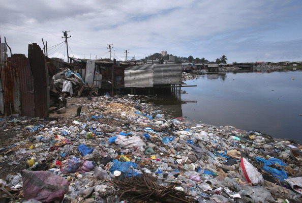 Garbage litters the waterfront in the West Point slum on August 19, 2014 in Monrovia, Liberia. With a population of 75,000 people in a small area with poor sanitation, sickness is common in the township. A holding center in West Point for people suspected of having the Ebola virus was overrun and shut down by a crowd on August 16. 