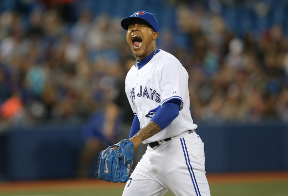 Marcus Stroman #54 of the Toronto Blue Jays reacts after getting the final out of the fifth inning during MLB game action against the Boston Red Sox on August 27, 2014 at Rogers Centre in Toronto, Ontario, Canada. (Photo by Tom Szczerbowski/Getty Images).
