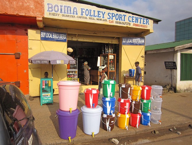 According to local reports the sale of water buckets has increased dramatically, because they are used by Liberian people to fill with disinfectant and to wash their hands to prevent the spread of the deadly Ebola virus, in the city of Monrovia, Liberia, Monday, Aug. 4, 2014.