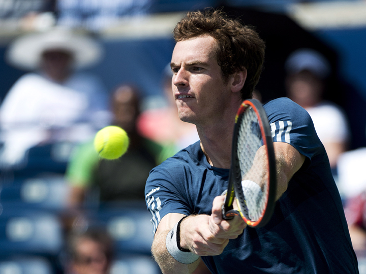 Andy Murray returns the ball against Nick Kyrgios during Rogers Cup tennis action in Toronto on Wednesday, August 6, 2014. 