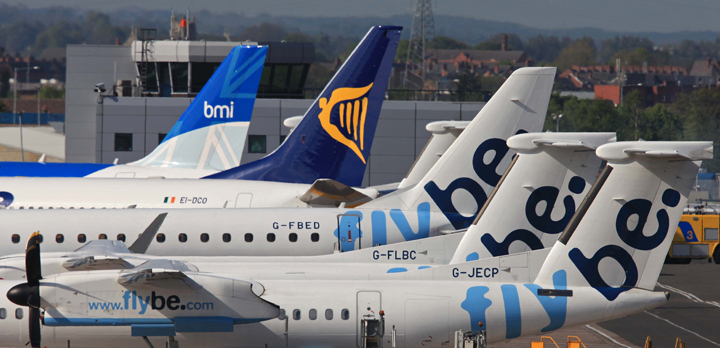 Grounded aircraft sit on the apron at Belfast City Airport, in Belfast, Northern Ireland on May 17, 2010. 