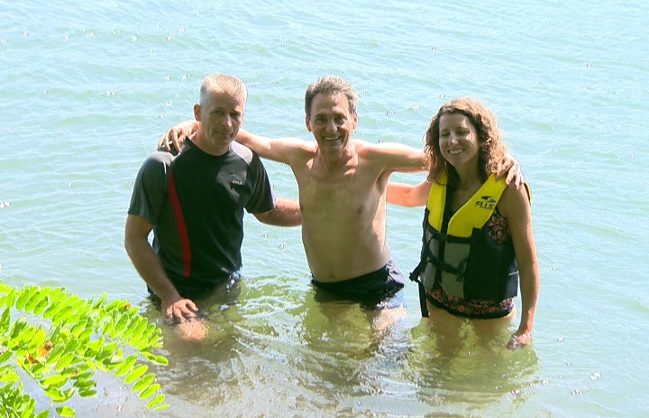 The Projet Montreal team in the water near Verdun to promote the idea of a new beach in the area on August 6, 2014.