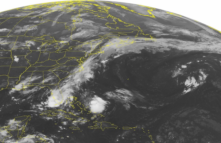 This NOAA satellite image taken Monday, Aug. 4, 2014 at 01:45 AM EDT shows an elongated stationary front extending across the entire East Coast and into the Southeastern United States. 