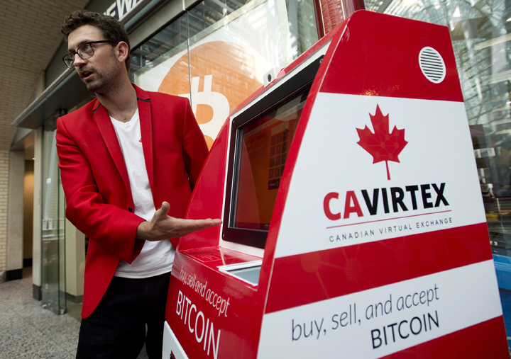 Kyle Kemper, Cavirtex's vice-president of business development, introduces six new Bitcoin Teller Machines in Toronto on Wednesday, August 13, 2014. 