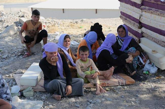 Displaced Yazidis are pictured in the Qandil mountains near the Turkish border, northwest of Baghdad, Iraq, Saturday, Aug. 16, 2014.