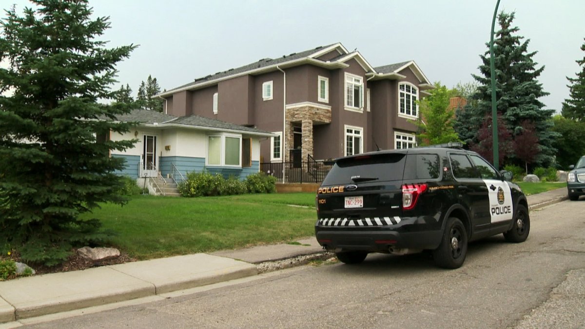 Calgary police investigate the discovery of bones in the backyard of a Bankview home on Saturday, August 2nd, 2014.