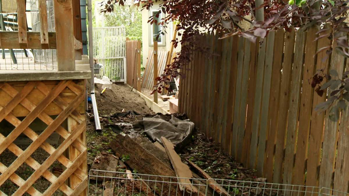 Calgary police investigate the discovery of bones in the backyard of a Bankview home on Saturday, August 2nd, 2014.