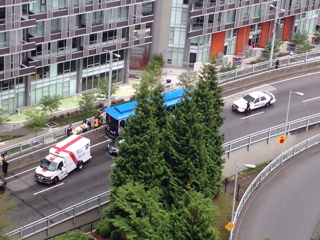 View of the scene after a bus and car collide on the Granville Street Bridge, photo by @Mark380.