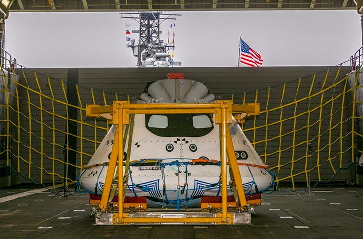 NASA's Orion spacecraft test vehicle sits in the well deck of the USS Anchorage at the Port of Los Angeles on Wednesday, Aug. 6, 2014. NASA, Lockheed Martin and the U.S. Navy will conduct recovery tests for the capsule in the Pacific Ocean, simulating its return from a space mission. (AP Photo/Damian Dovarganes).