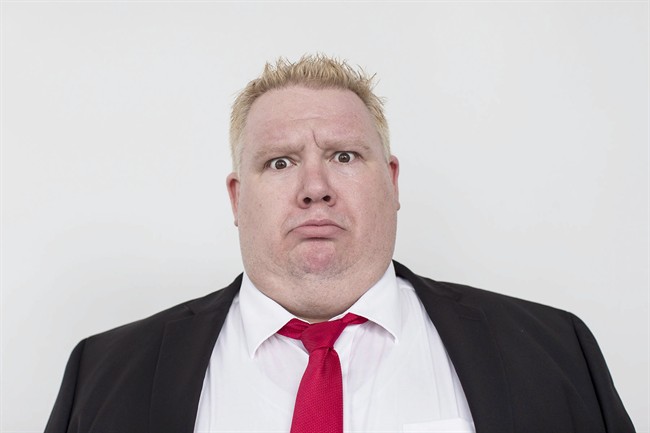 Actor Sheldon Bergstrom poses for a photo in Toronto on Tuesday August 5, 2014, as he prepares for the role of Rob Ford in the upcoming musical "Rob Ford the Musical: Birth of A Ford Nation" .