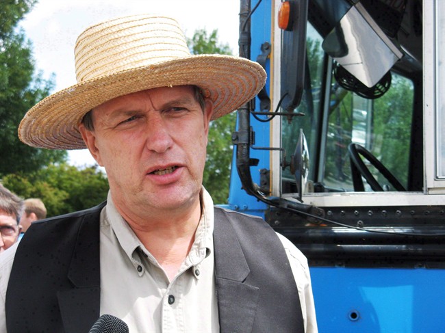Farmer Michael Schmidt talks to reporters on Thursday July 31, 2008 outside court in Newmarket, Ont.