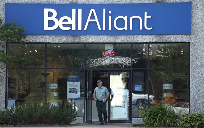 A customer leaves a Bell Aliant retail location in Dartmouth, N.S. on July 23, 2014.