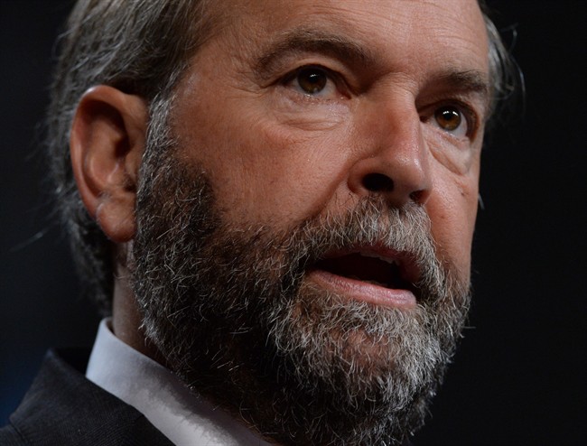 NDP Leader Tom Mulcair addresses the Canadian Medical Association's annual meeting in Ottawa on Wednesday morning, Aug. 20, 2014. Sean Kilpatrick/The Canadian Press.
