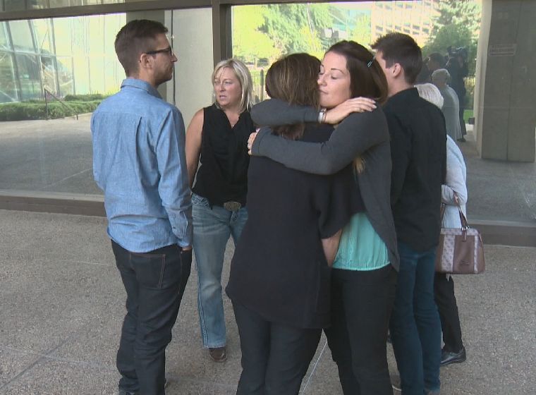 Members of Curtis Dugray's family outside the Edmonton Courthouse on August 22, 2014.