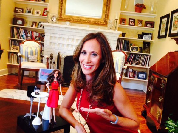 Erica with her doll.