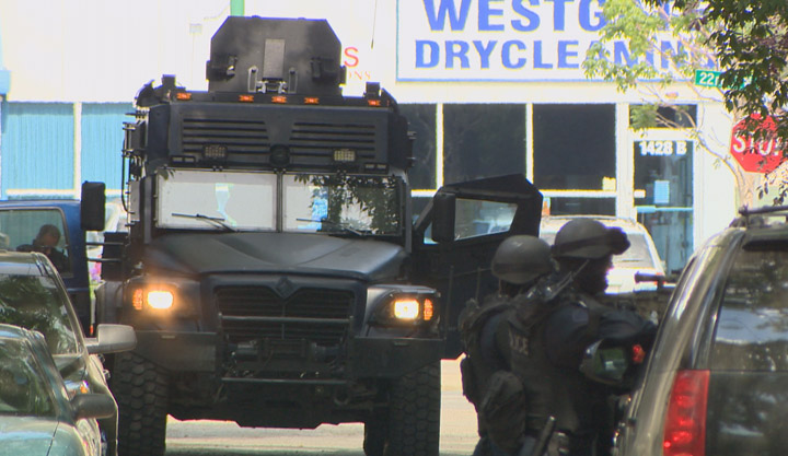 Saskatoon police dealing with a standoff in the 100-block of Avenue O South on Tuesday Aug. 12, 2014.