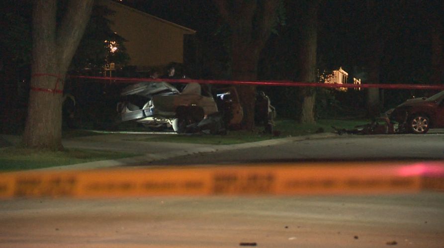 Police investigate a collision in Edmonton's west end that resulted in the death of two men, Sunday, August 24, 2014. 