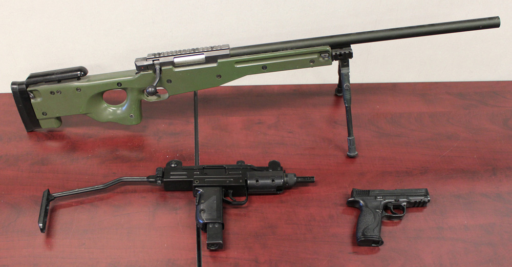 A file photo of three types of airsoft guns (long gun, assault weapon, and pistol).