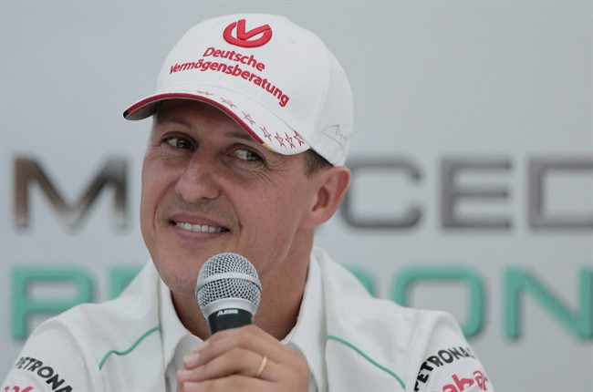 FILE - In this Thursday, Oct. 4, 2012 file photo, Michael Schumacher announces his retirement from Formula One at the end of the 2012 season during a press conference at the Suzuka Circuit venue for the Japanese Formula One Grand Prix in Suzuka, Japan.