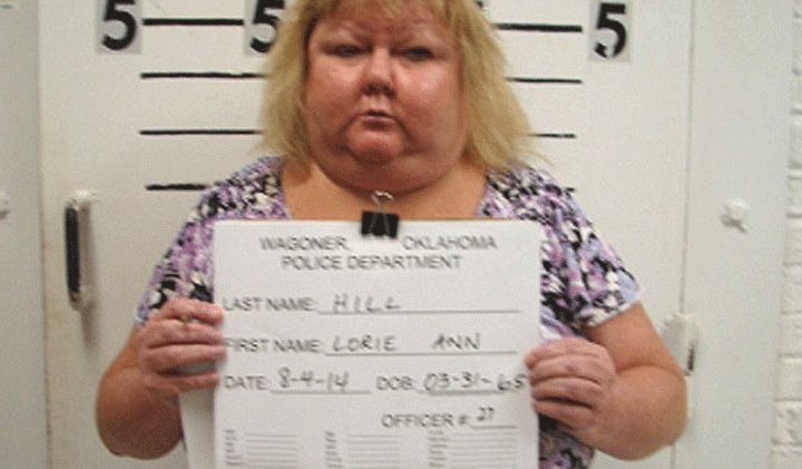 Lorie Ann Hill was arrested August 4  after she showed up both intoxicated and without pants on her first day of work according to police.