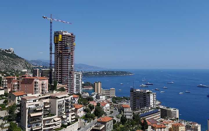 This picture taken on August 22, 2013, in Monaco shows the Odeon tower and a crane.