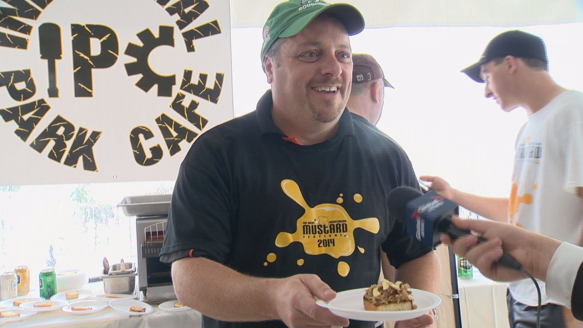 Todd Taylor shows off his prize-winning dish at the Great Saskatchewan Mustard Festival in The Willow on Wascana on Sunday.