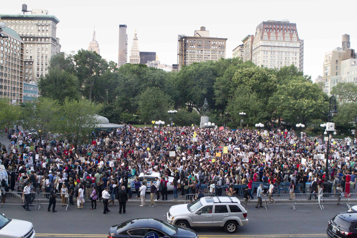 Protesters march in New York City’s Union Square, Thursday, Aug. 14, 2014. 