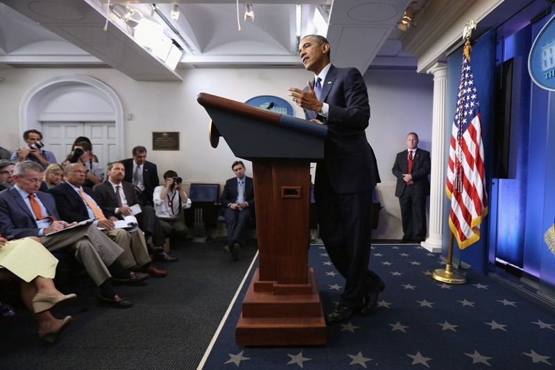 U.S. President Barack Obama delivers remarks and takes reporters' questions in the Brady Press Briefing Room at the White House August 1, 2014 in Washington, DC. (Photo by Chip Somodevilla/Getty Images).